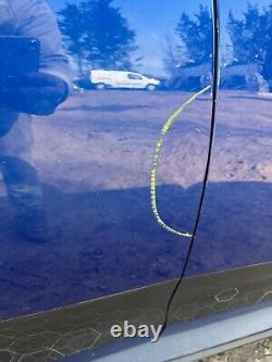 Porte arrière complète du côté conducteur de la Dacia Duster Se Twenty 2020 en bleu O/S/R